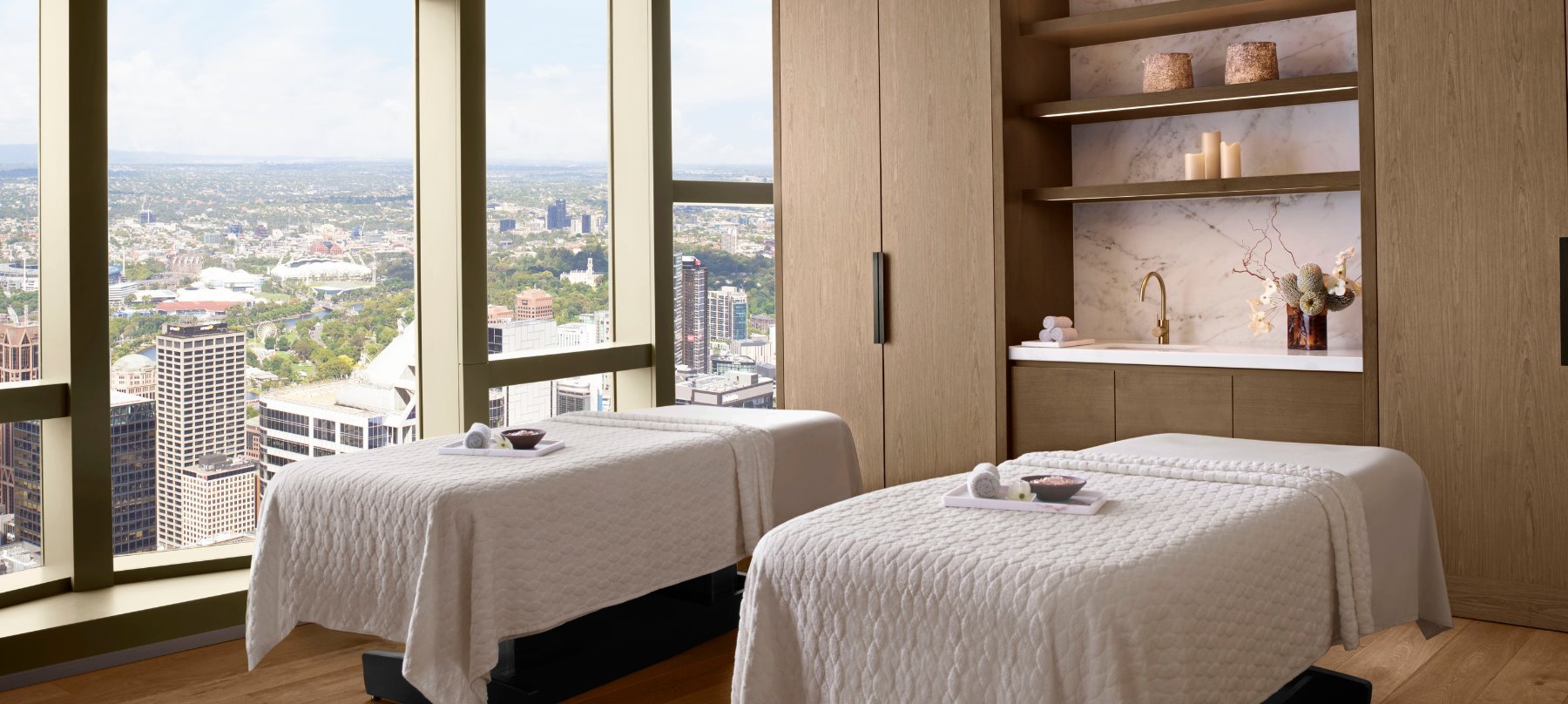 Elegant spa treatment room with warm lighting at The Ritz-Carlton Spa, Melbourne